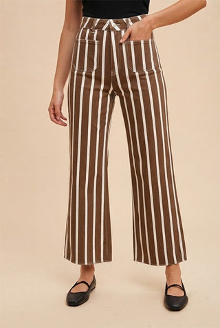 Brown and white vertical stripe wide-leg cropped pants with patch pockets and frayed hem