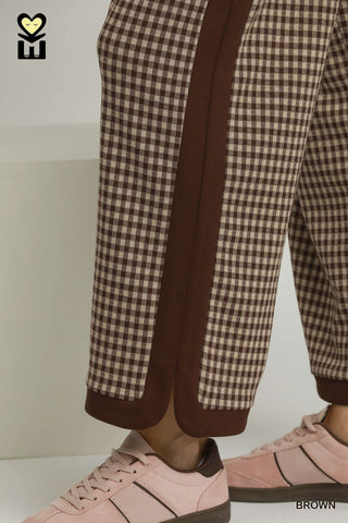 Brown gingham jogger pants with solid brown side stripe and ribbed cuffs