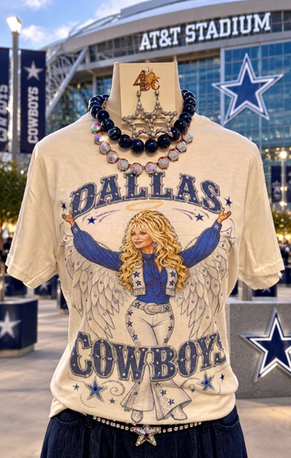 Cream Dallas Cowboys graphic tee with Dolly Parton angel print and rhinestone accents
