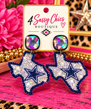 Navy and silver glitter Texas-shaped dangle earrings with iridescent crystal studs and star detail
