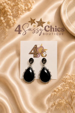Black teardrop dangle earrings with silver scalloped bezel and oval stud top