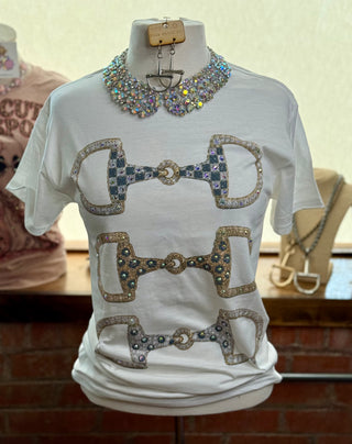 White graphic tee with stacked rhinestone snaffle bit prints and crystal collar necklace