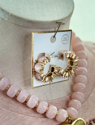 Gold dipped blush pink cluster hoop earrings on card with pink beaded necklace
