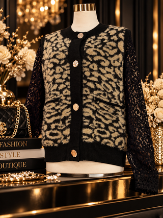 Black and beige leopard print cardigan with lace sleeves and gold coin buttons on mannequin