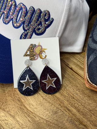 Navy glitter teardrop earrings with leopard print star design on earring card