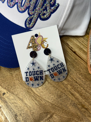 Silver glitter teardrop dangle earrings with navy Dallas Cowboys stars and Touchdown text