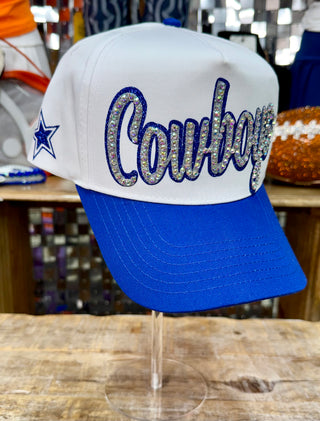 White and royal blue Cowboys trucker hat with rhinestone and glitter script lettering