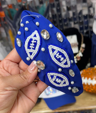 Royal blue knotted headband with beaded football motifs, pearl and rhinestone accents