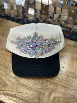 Cream and black two-tone baseball cap with large iridescent AB crystal rhinestone appliqué