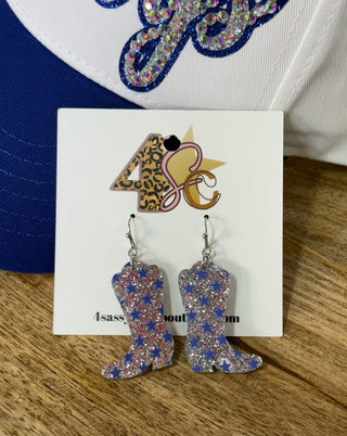 Glittery cowboy boot dangle earrings with blue stars on silver fishhook wires