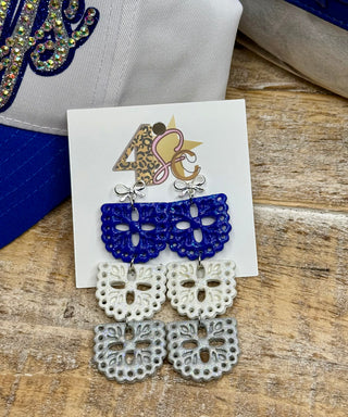 Three-tier papel picado dangle earrings in royal blue, white, and silver glitter resin