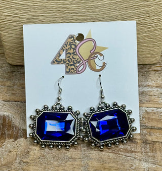 Blue faceted gemstone drop earrings in ornate silver-tone beaded rope frames
