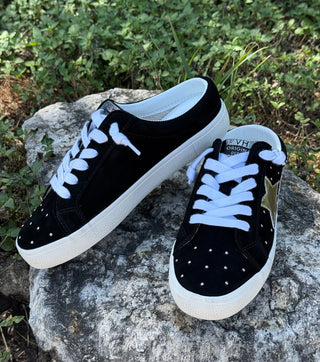 Vintage Havana black suede sneakers with white laces, gold star, and silver studs