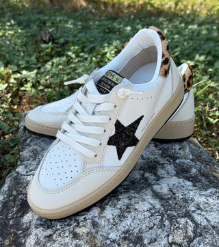 White leather sneakers with black glitter star and leopard print heel detail