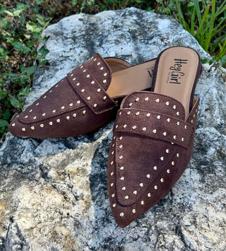 Dark brown suede studded mule with pointed toe and gold dome studs