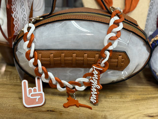 Selena Football Showdown clear stadium bag with burnt orange and white Longhorns chain strap