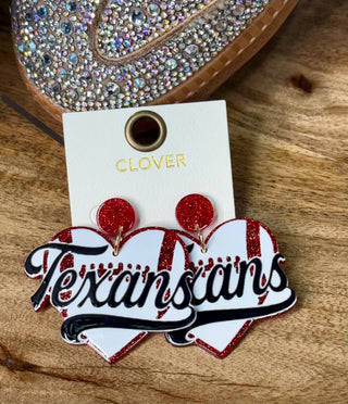 Red glitter stud dangle earrings with white heart-shaped Texans script pendants