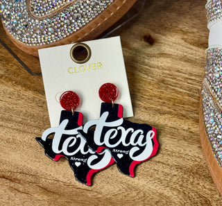 Texas Strong dangle earrings in black glitter acrylic with red and white script lettering
