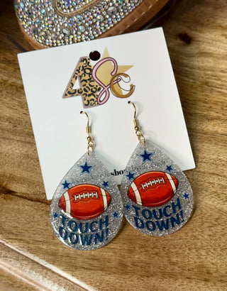Silver glitter teardrop earrings with football and Touchdown text, gold hooks