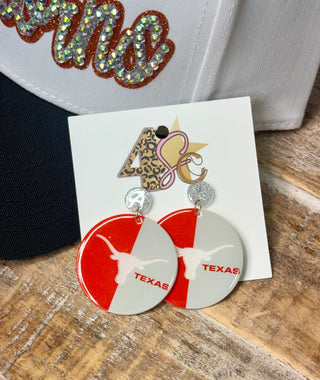 Round red and white Texas Longhorns dangle earrings with silver glitter stud tops