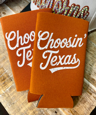 Burnt orange slim can koozies with white distressed Choosin' Texas retro script