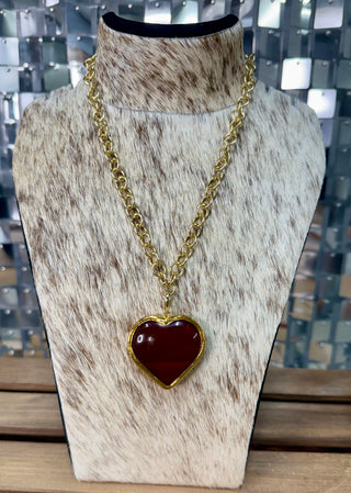 Chunky gold-tone chain necklace with oversized burgundy enamel heart pendant