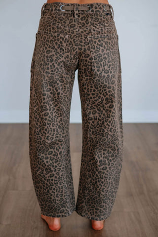 Wide-leg leopard print pants in brown and black by Risen, back view