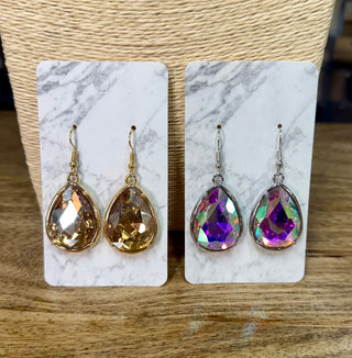 Teardrop crystal dangle earrings in gold champagne and iridescent purple silver settings