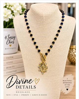 Navy crystal beaded gold-tone rosary necklace with rhinestone Virgin Mary medallion pendant