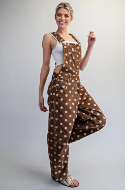 Brown polka dot wide-leg bib overalls with adjustable straps and side cutout