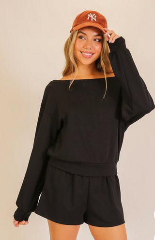 Black oversized long sleeve top and matching shorts set by Timing