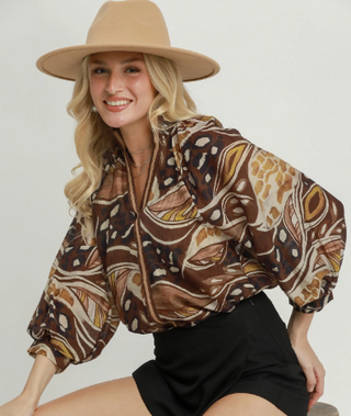 Umgee brown abstract print billowy blouse with ruffled bib and banded cuffs