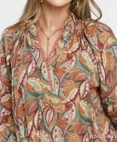 Umgee Autumn Sunset blouse with earthy botanical leaf print and ruffled V-neckline