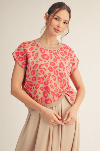 Pink leopard print cropped knit top with twisted knot hem detail and short sleeves